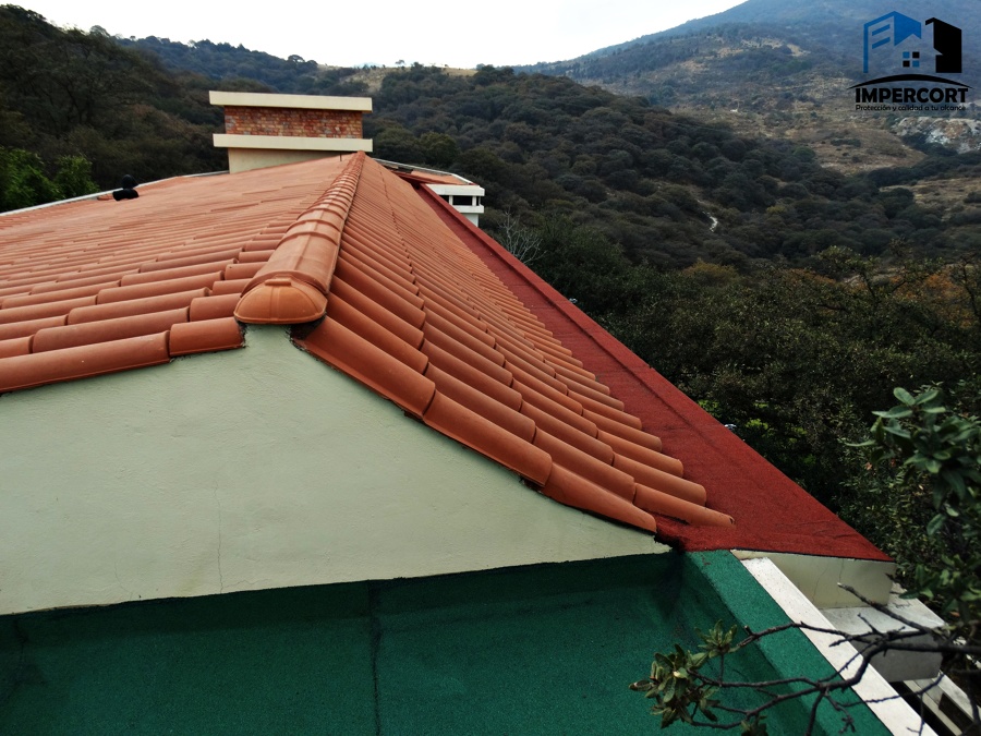 Prefabricado color verde y rojo terracota.
