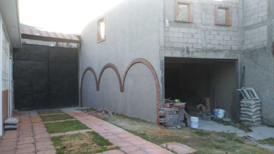 Aplanados y arcos de ladrillo