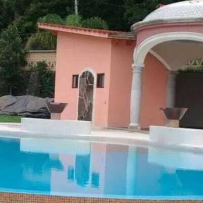 Terraza jardin y alberca