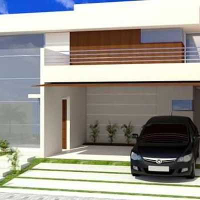 Casa con cochera del lado derecho de la fachada