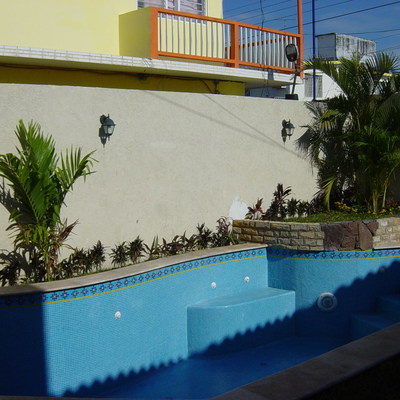 Alberca con azulejo veneciano