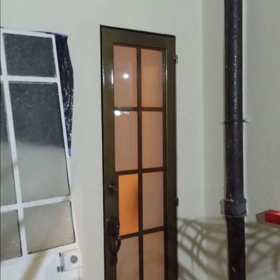 Puerta Herreria patio acabado en uretano aperlado