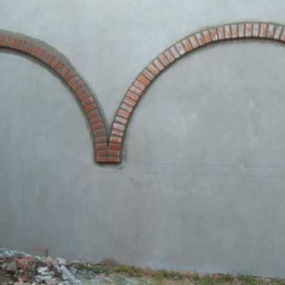 Arcos de ladrillo y aplanado