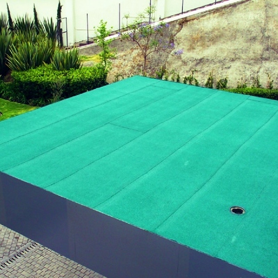 Sistema prefabricado acabo gravilla color verde ecológico.