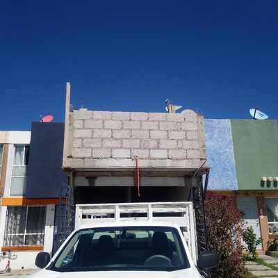 Ampliación en muros colindantes