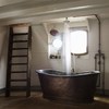 Bold-Rustic-Bathroom-with-Copper-Bathtub