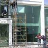 FACHADA E CRISTAL TINTEX CON ARAÑAS DE INOX.